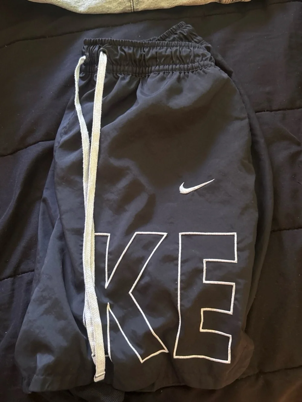 Nike Black Kids Athletic Shorts with White Drawstring and Logo